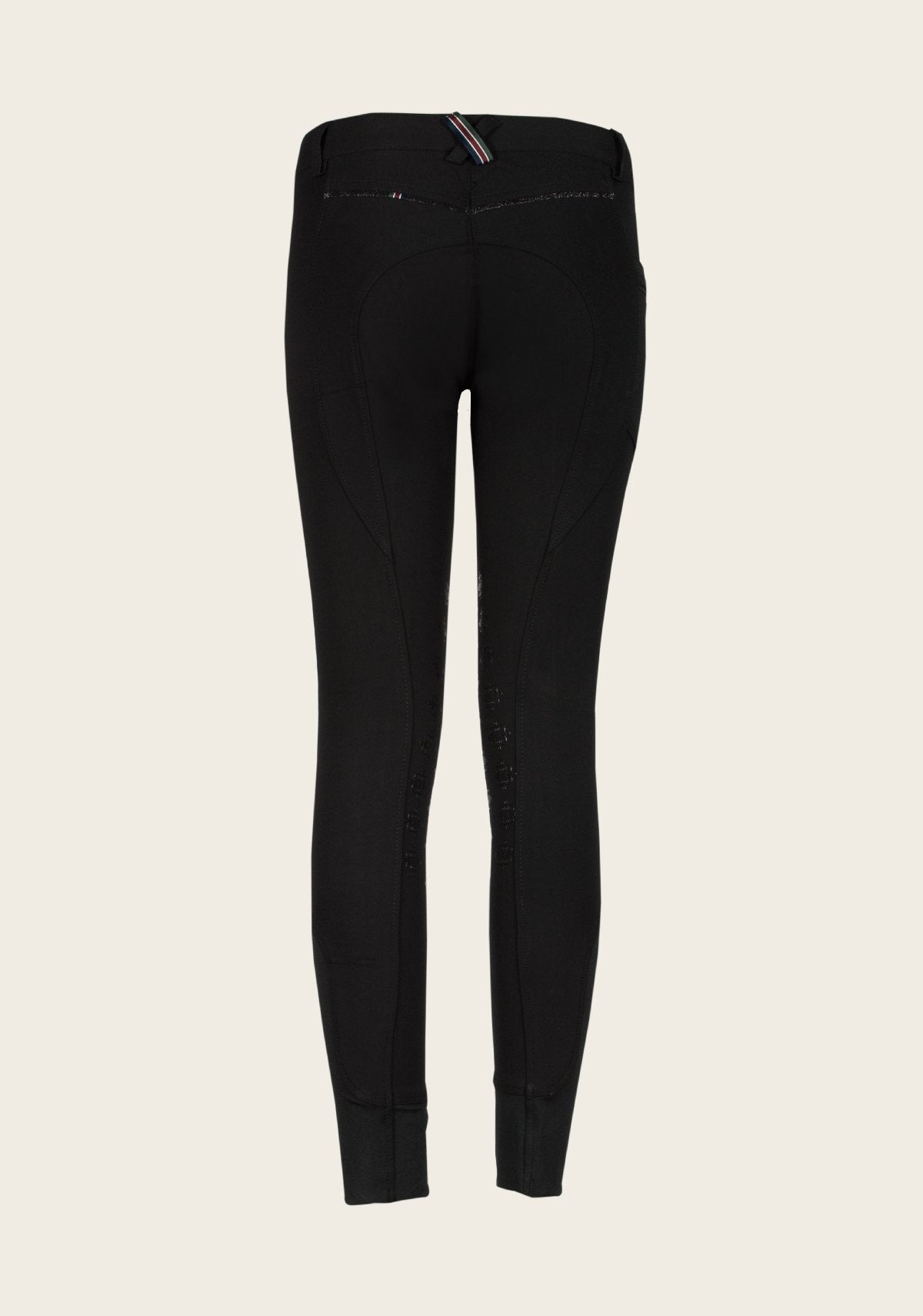 Back view of Espoir Breech showcasing signature crossed back belt loop in Espoir colors, contoured seams, and smooth waistband for rider comfort and style.