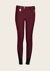 Front view of Espoir breech showing sleek fit, glitter zip pockets, and stretch fabric for riding comfort