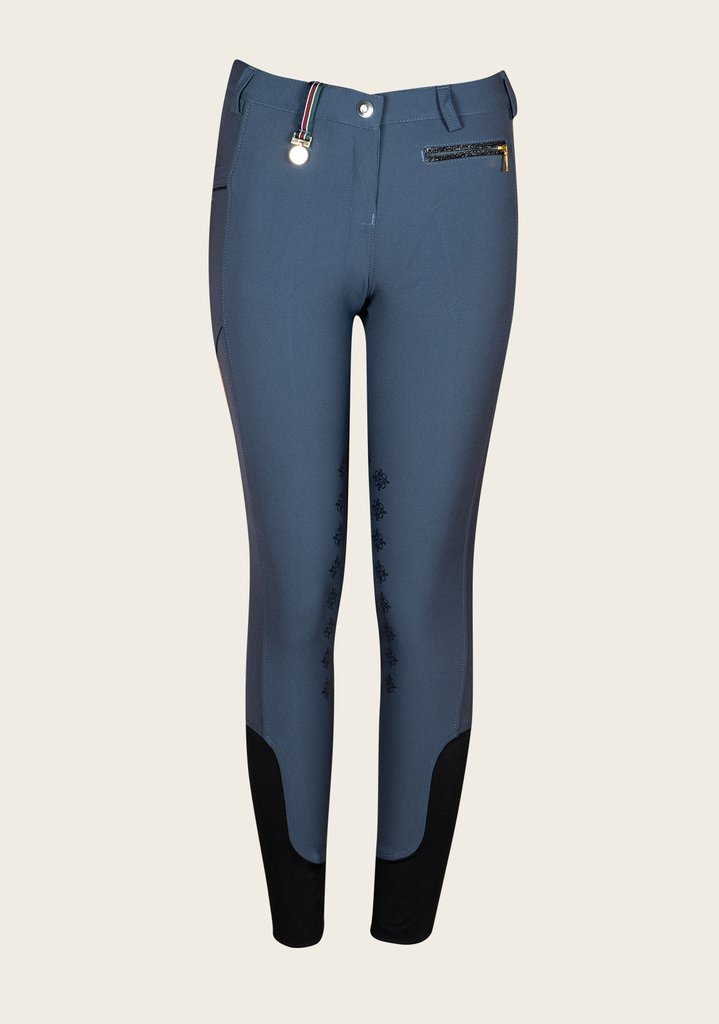 Front view of Espoir breech showing sleek fit, glitter zip accents, and technical stretch fabric for riding comfort.