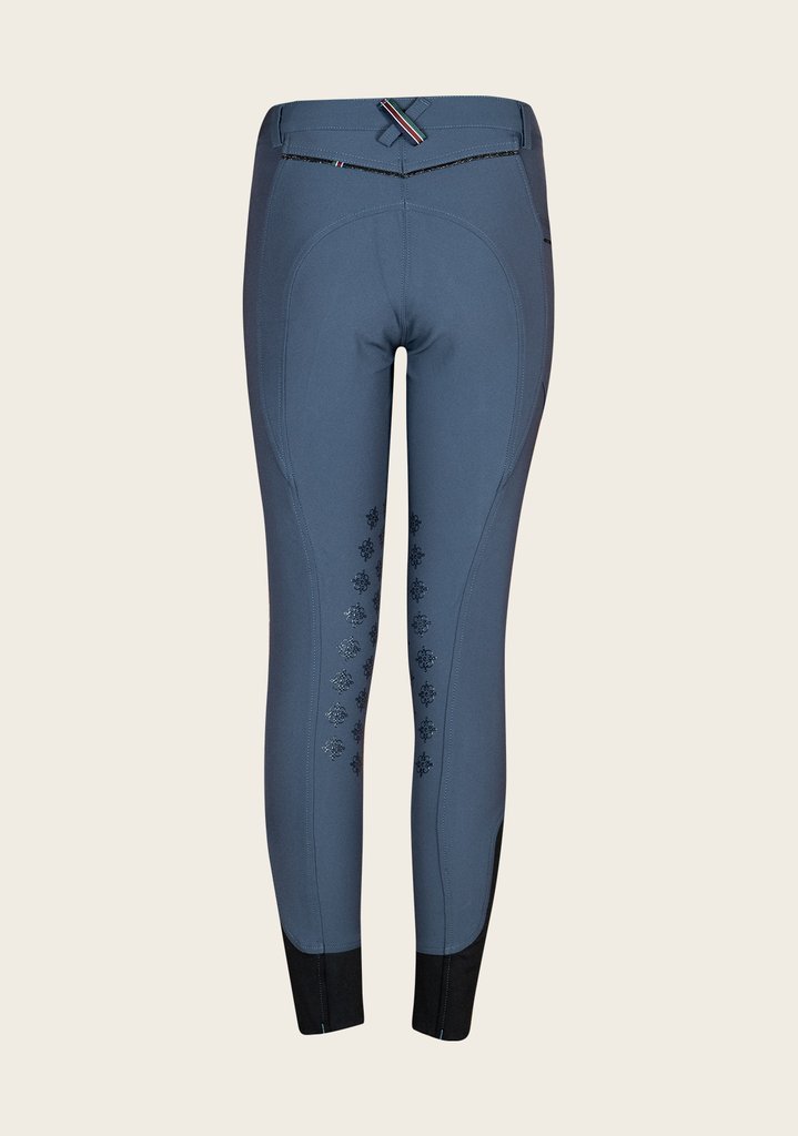Back view of Espoir breech featuring signature crossed belt loop in Espoir colors and flattering stitch detailing.