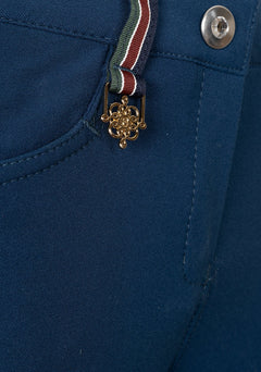 Close-up of Espoir breech pocket with custom golden nameplate and tone-on-tone zip detail.