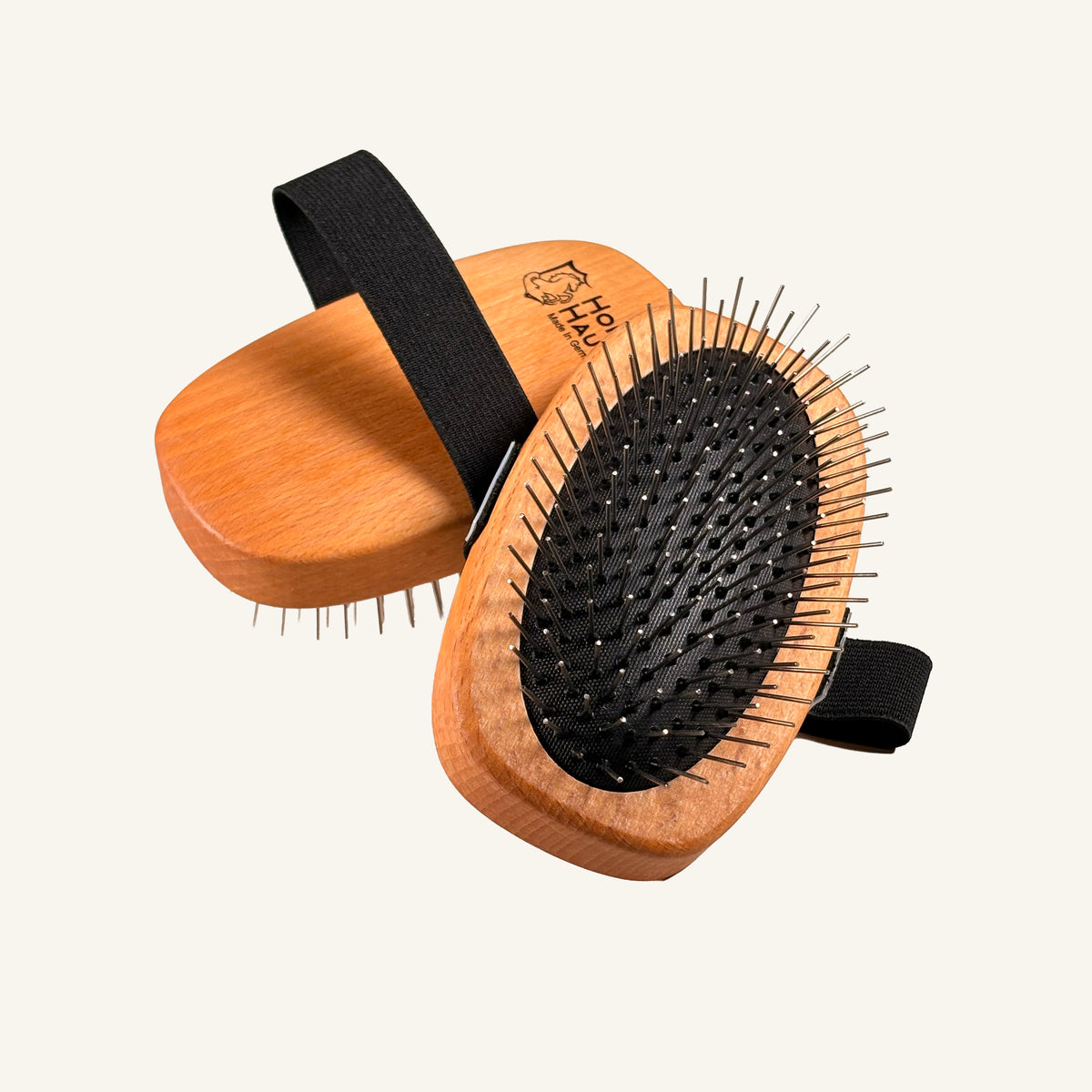 small mane and tail brush by HorseHaus with FSC-certified beech wood back, elastric strap, and durable rubber cushion