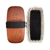 a brown natural horse brush with a raised white edge by horsehaus