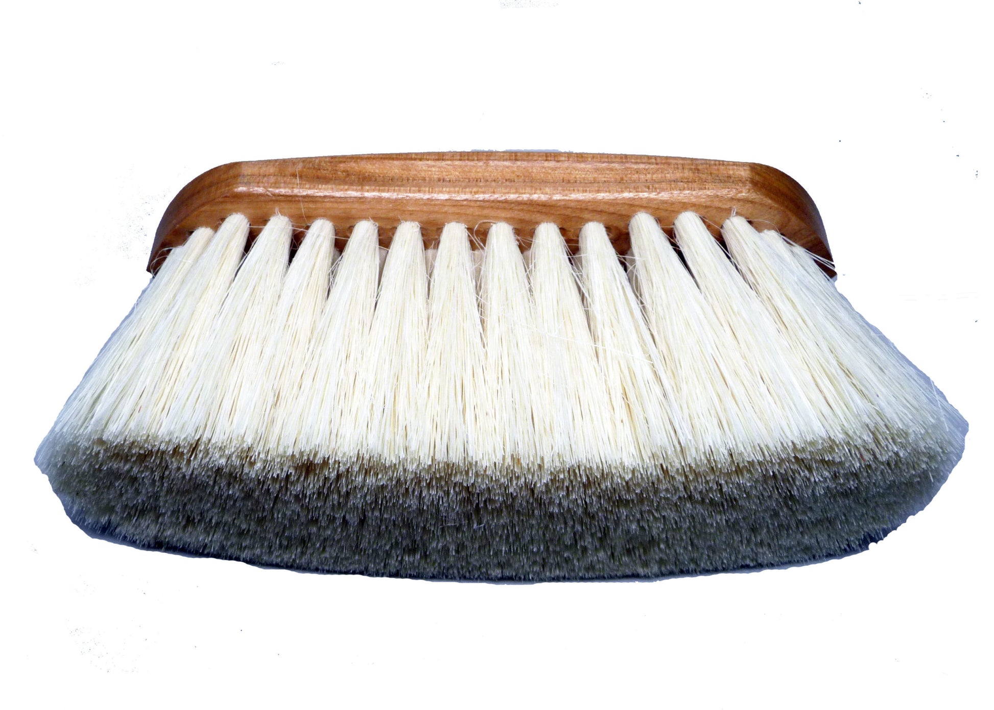 a horse dandy brush with natural long bristles